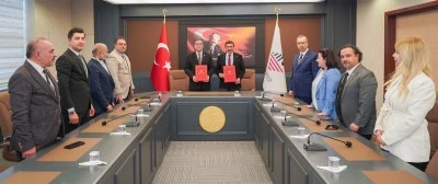 KİY&Uuml; ile Girne Amerikan &Uuml;niversitesi arasında iş birliği protokol&uuml; 